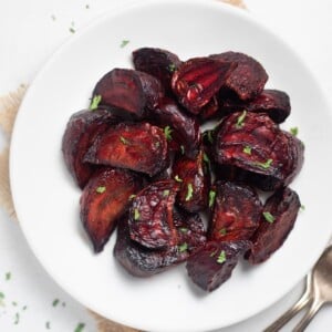 air fryer beets in a plate topped with parsley