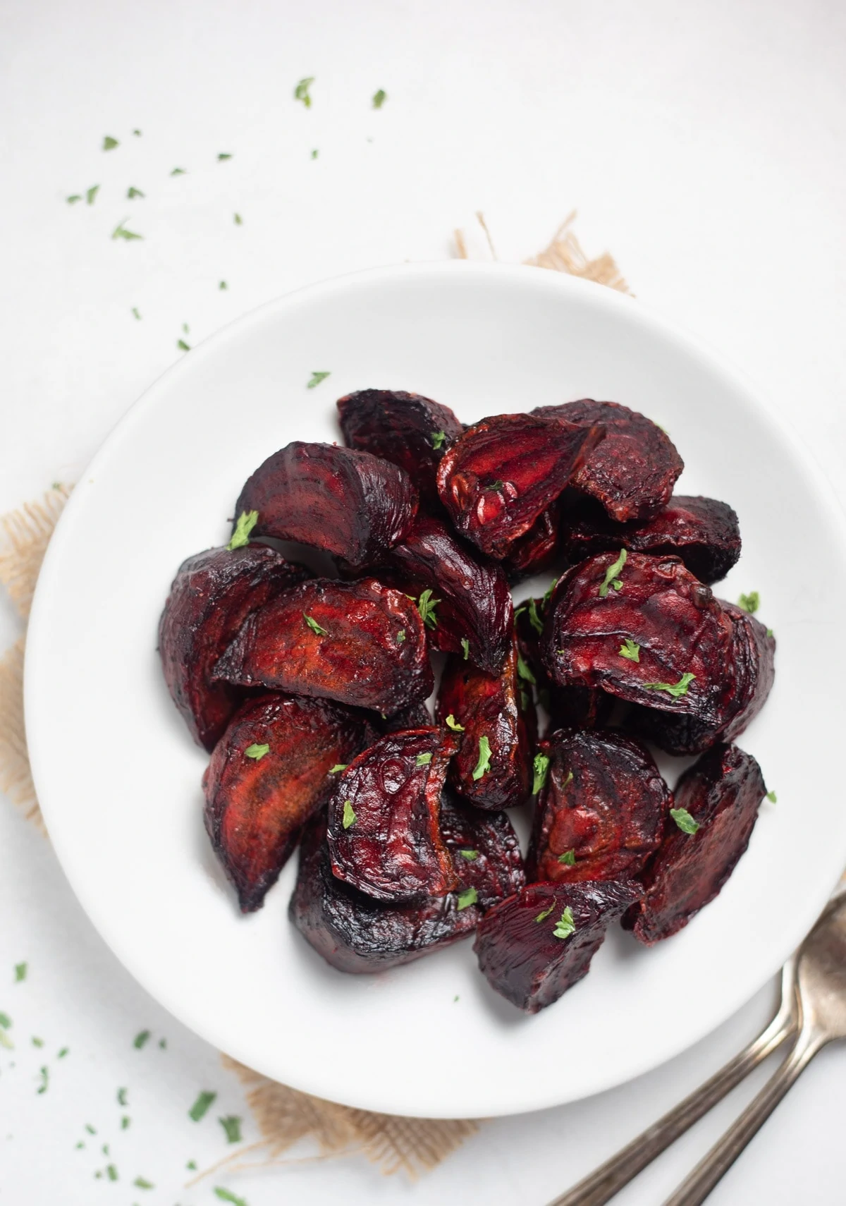 air fryer beets in a plate topped with parsley 