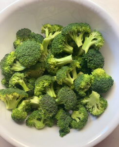 Broccoli seasoned in a bowl