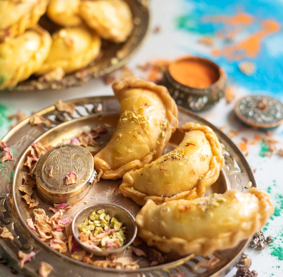 Mawa gujiya for holi served In a beautiful silver plate