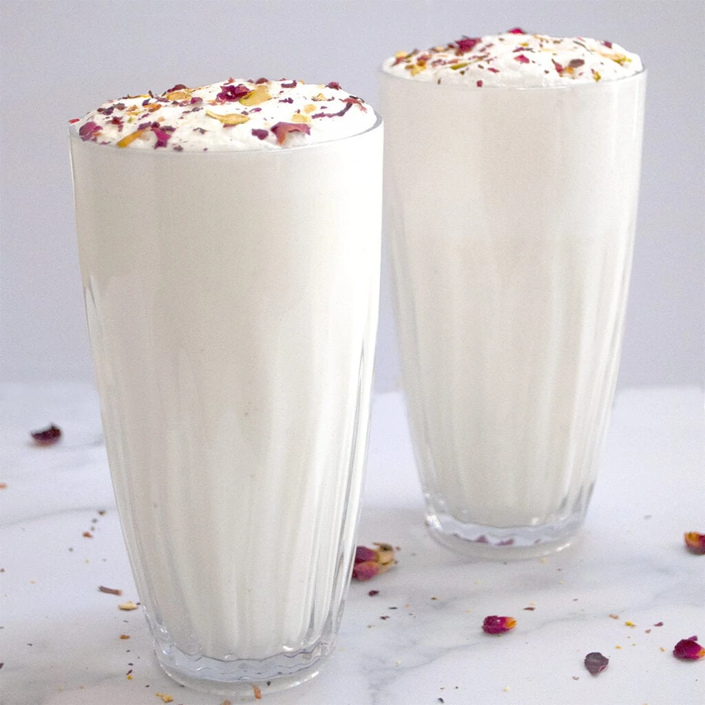 Sweet lassi garnished with dried rose petals