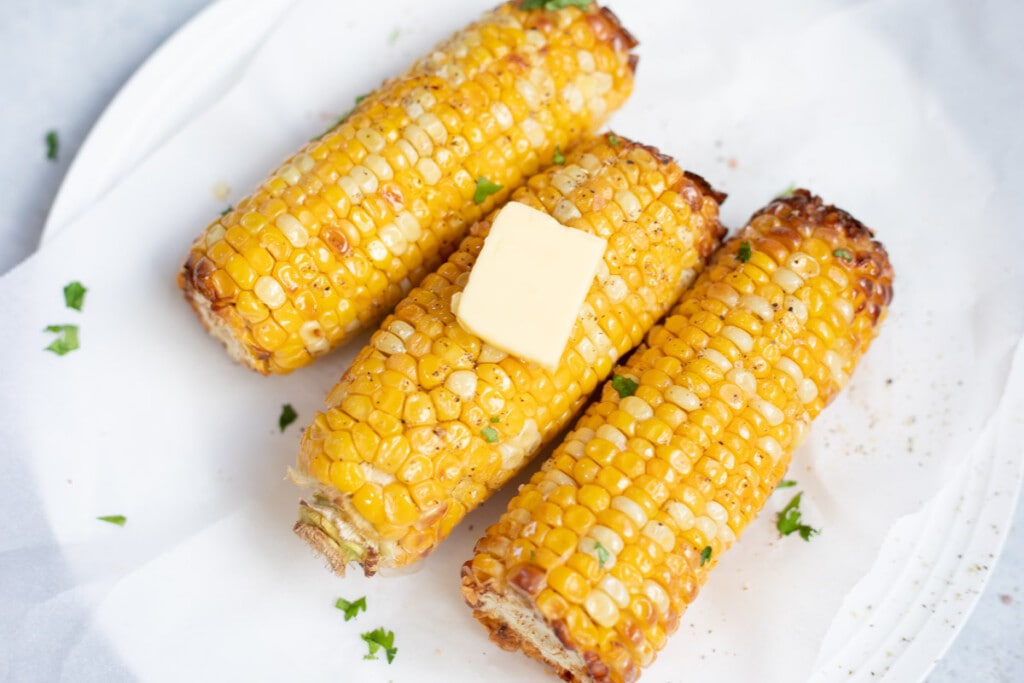 Summer corn on the Cobb topped with butter