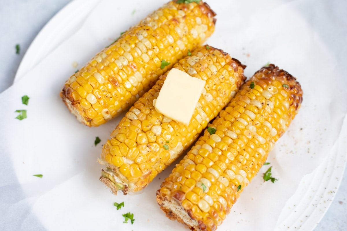 Summer corn on the Cobb topped with butter