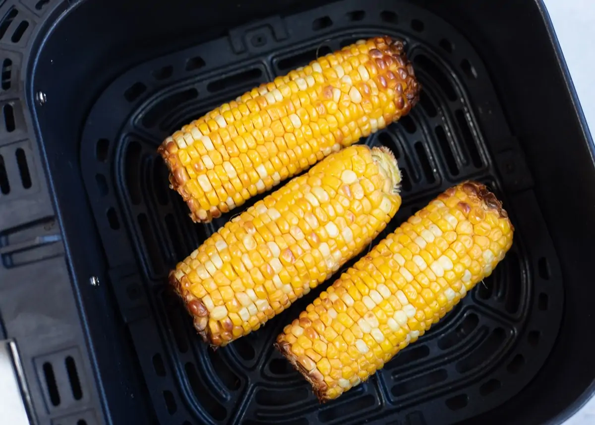 Corn on the Cobb in the air fryer basket 