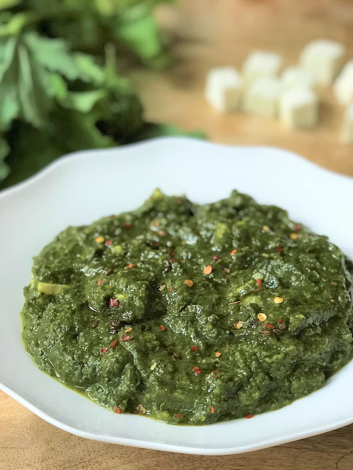 Instant pot Saag Paneer in a white plate 