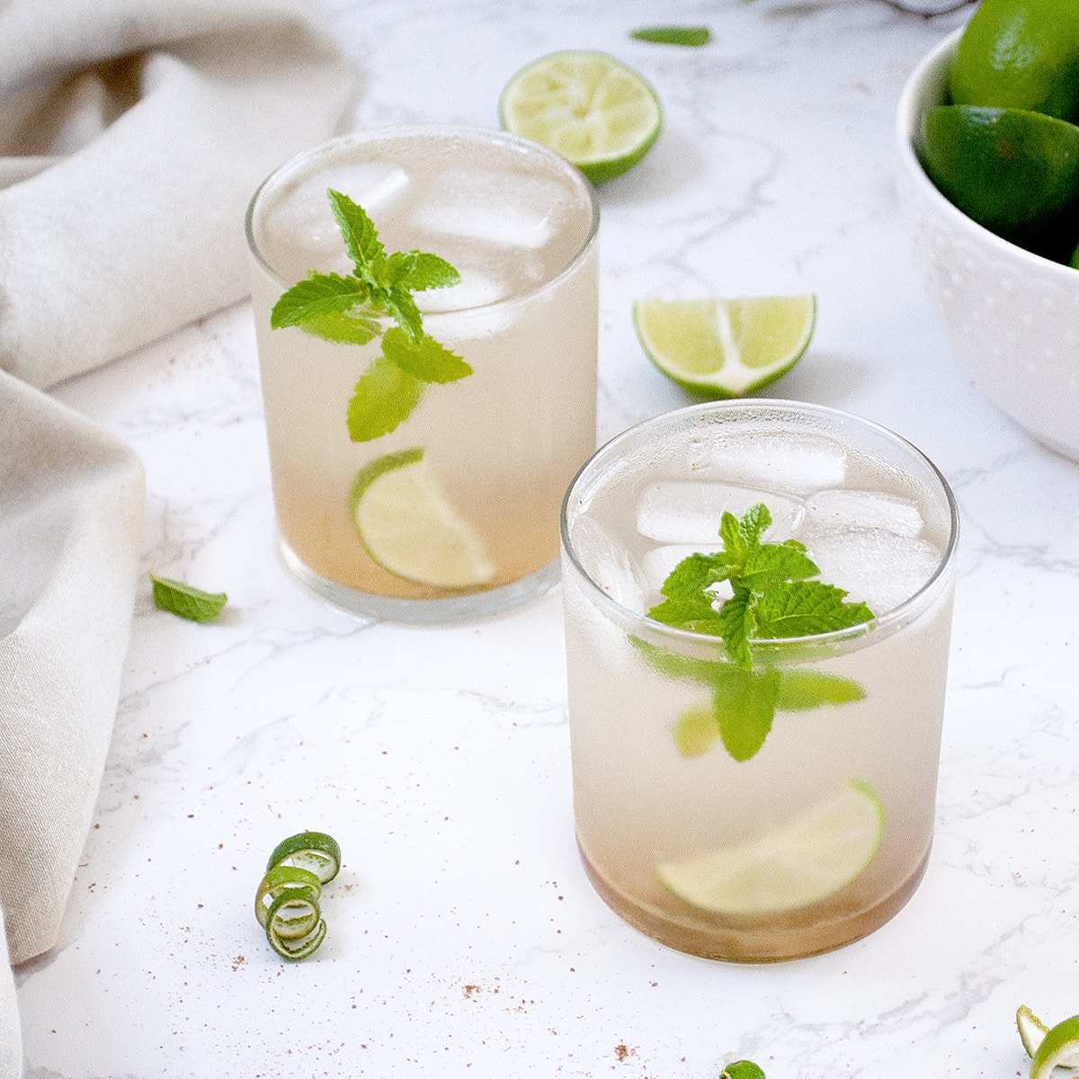 Nimbu pani garnished with mint leaves