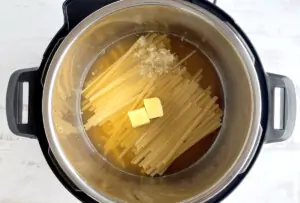 Pasta Ingredients - fettuccine, butter , garlic and broth in the instant pot