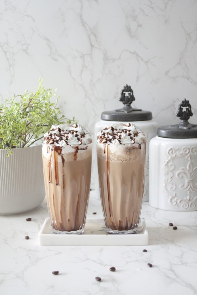 Cold coffee topped with whipped cream