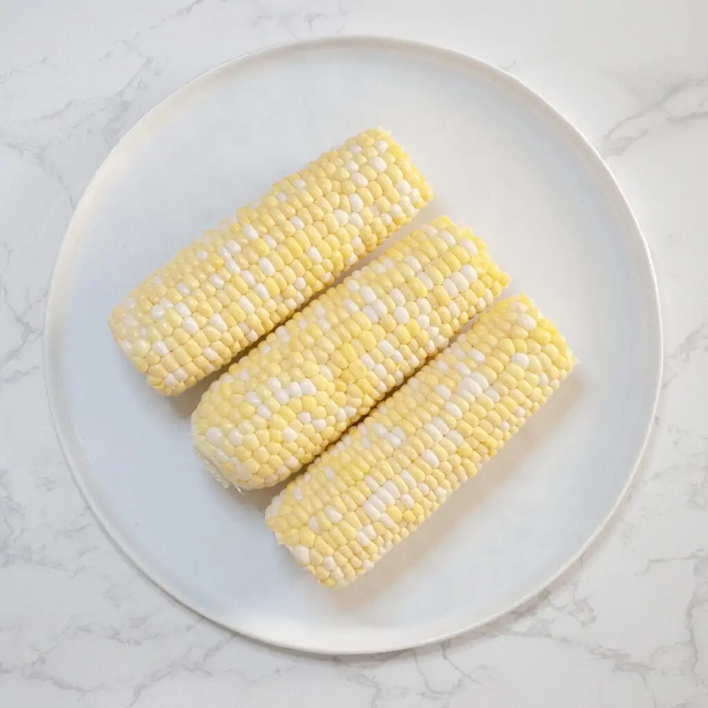 Uncooked Corns in a white plate