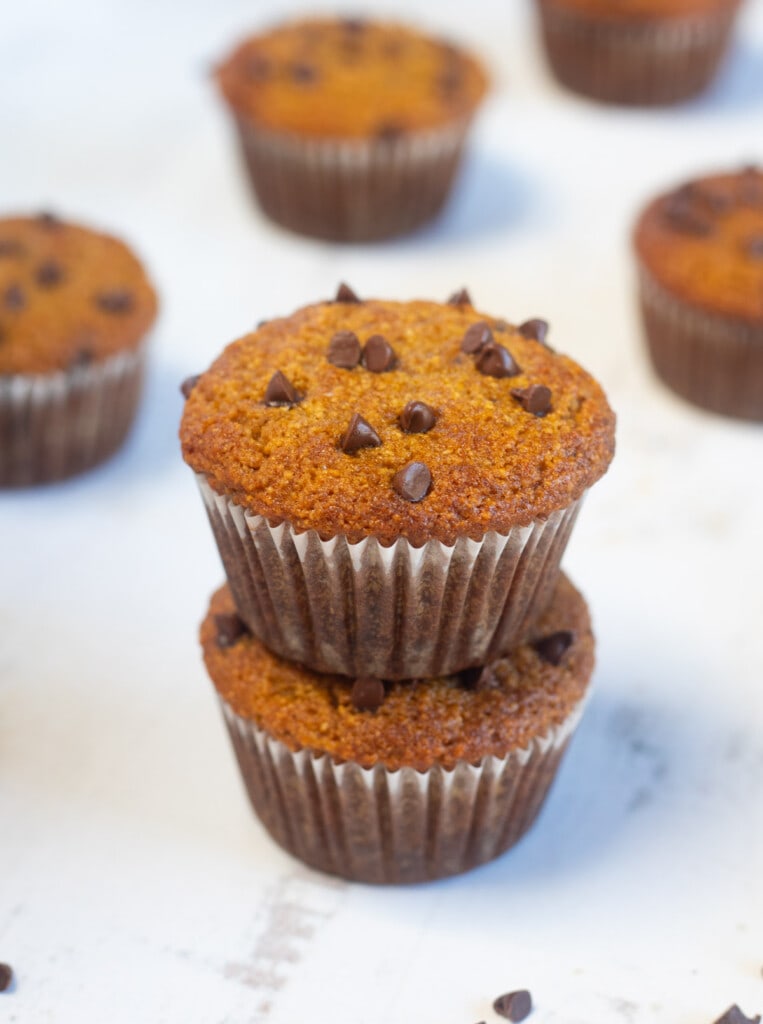 Paleo Pumpkin Muffins made with almond flour placed one over the other