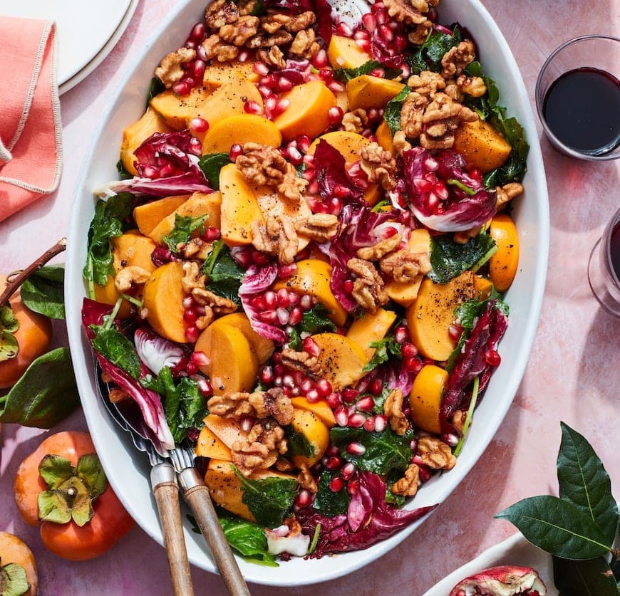 Persimon Salad in a large white serving bowl