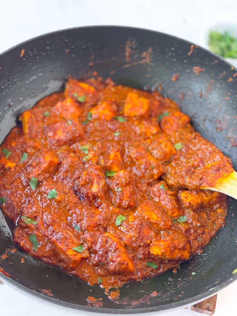 Paneer vindaloo curry in a pan 