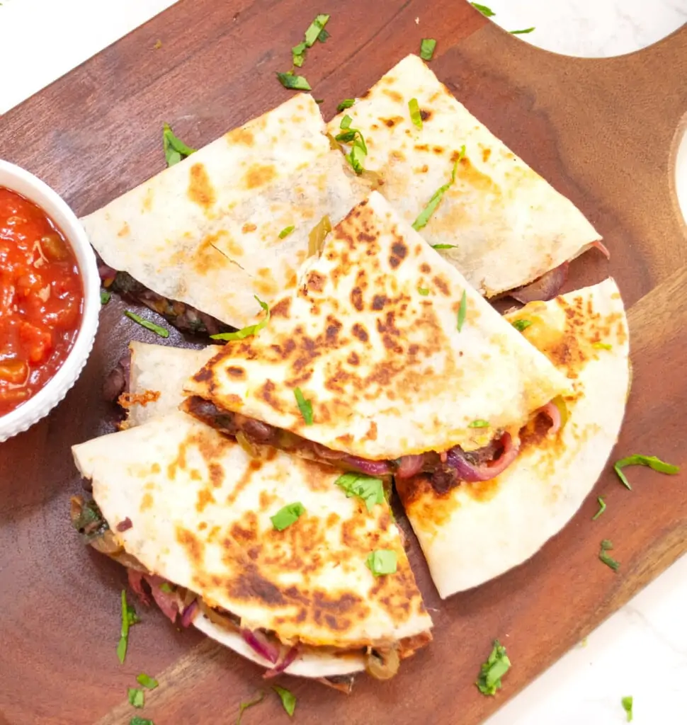 Loaded Black Bean Quesadilla with salsa on side