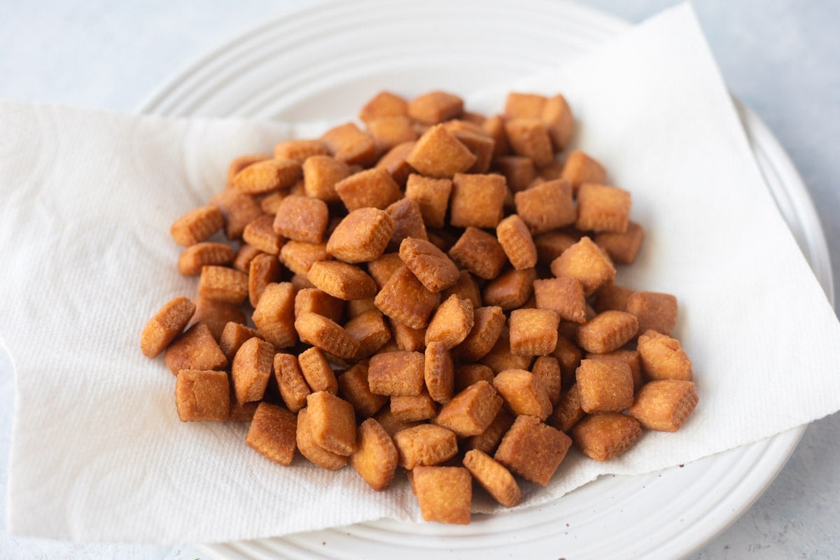 Shakarpara fried and placed on a paper towel
