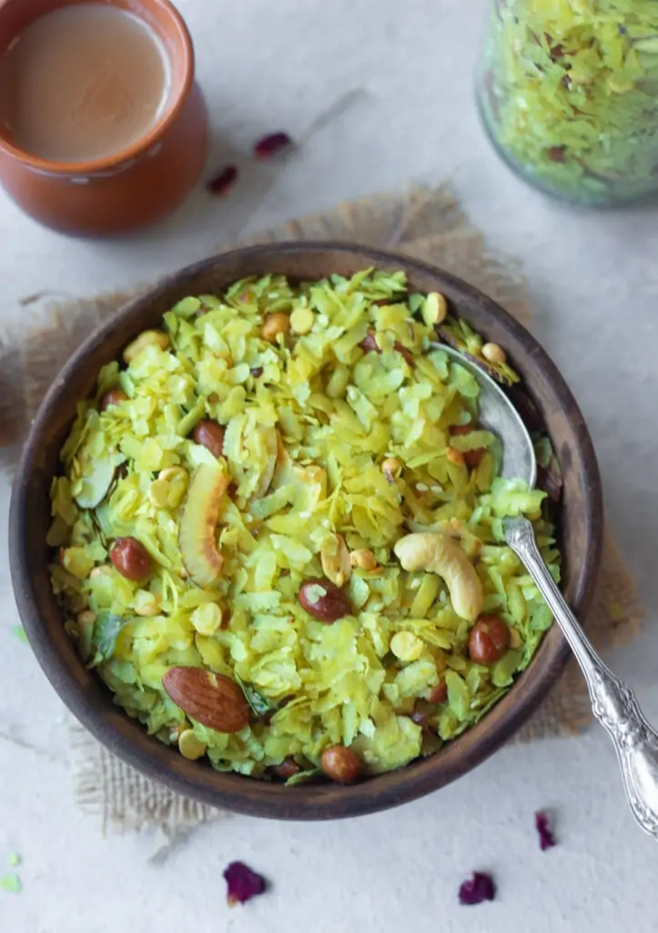 Poha Chivda in a wooden bowl served as a snack with chai
