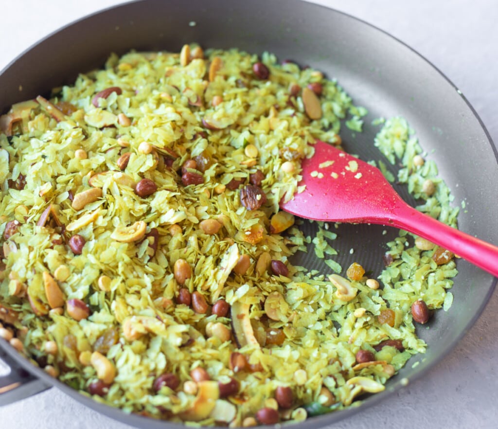 Roasted poha chivda in a large pan