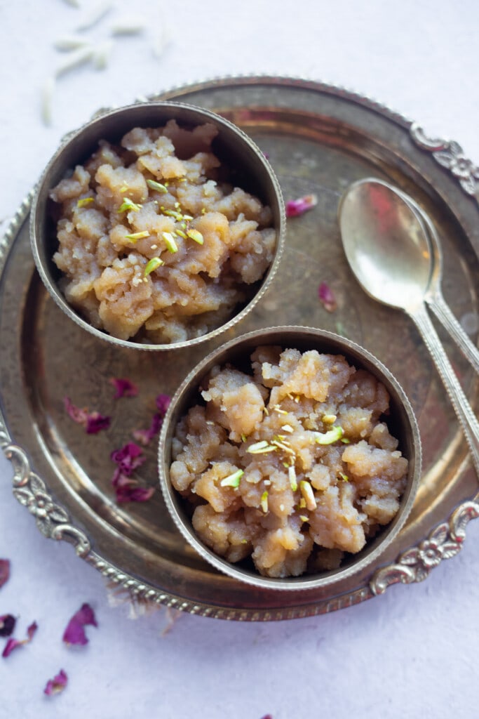Aate Ka Halwa made with wheat flour, ghee and sugar served in two bowls 
