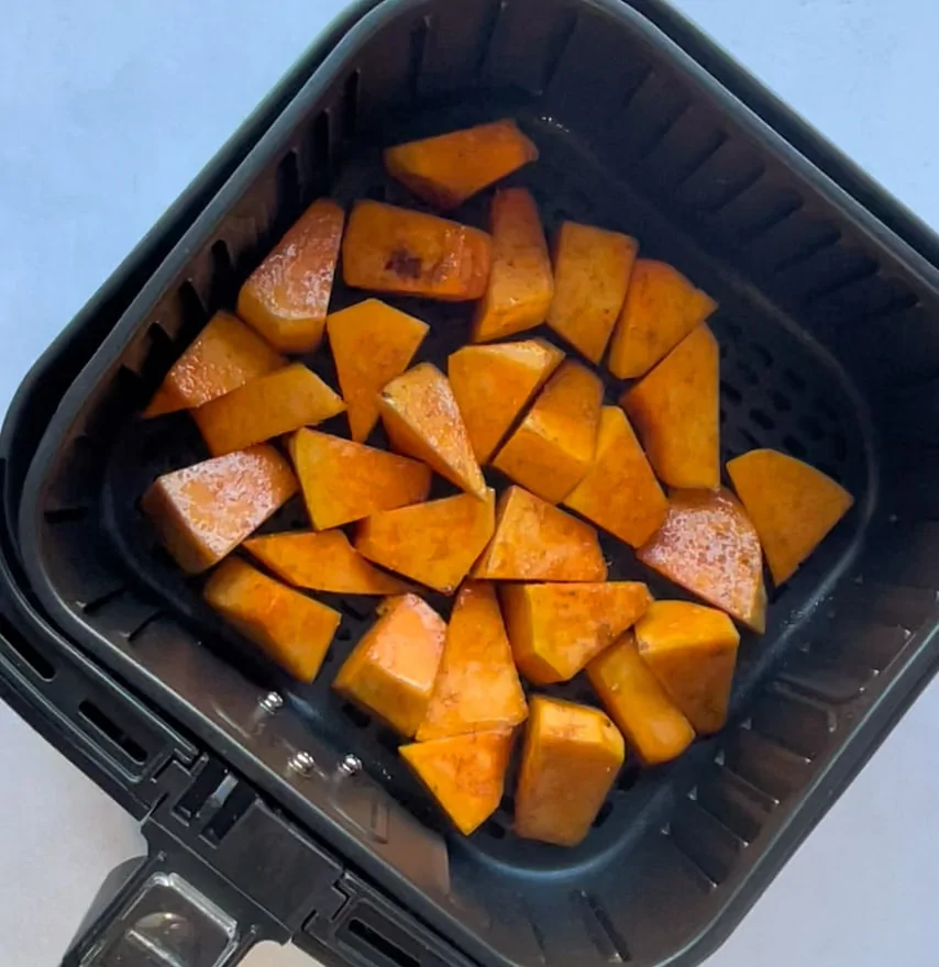 pumpkin cubes in the air fryer basket 