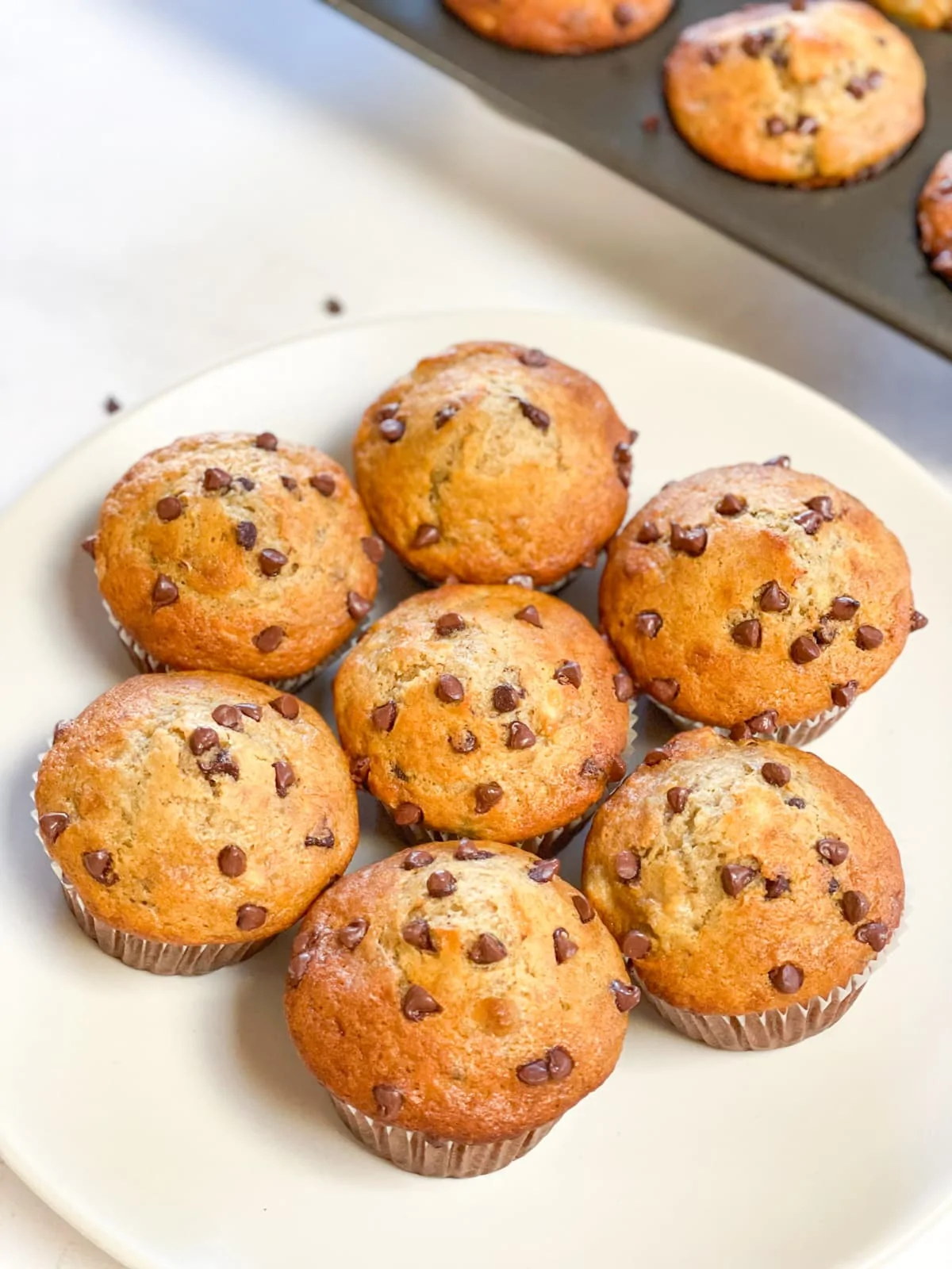 Perfectly baked easy banana and chocolate chip muffins in a plate 