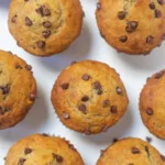 Moist banana chocolate chip muffins on a table