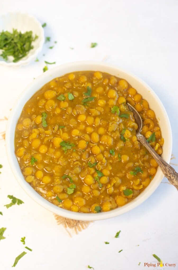 ragda in a bowl garnished with cilantro
