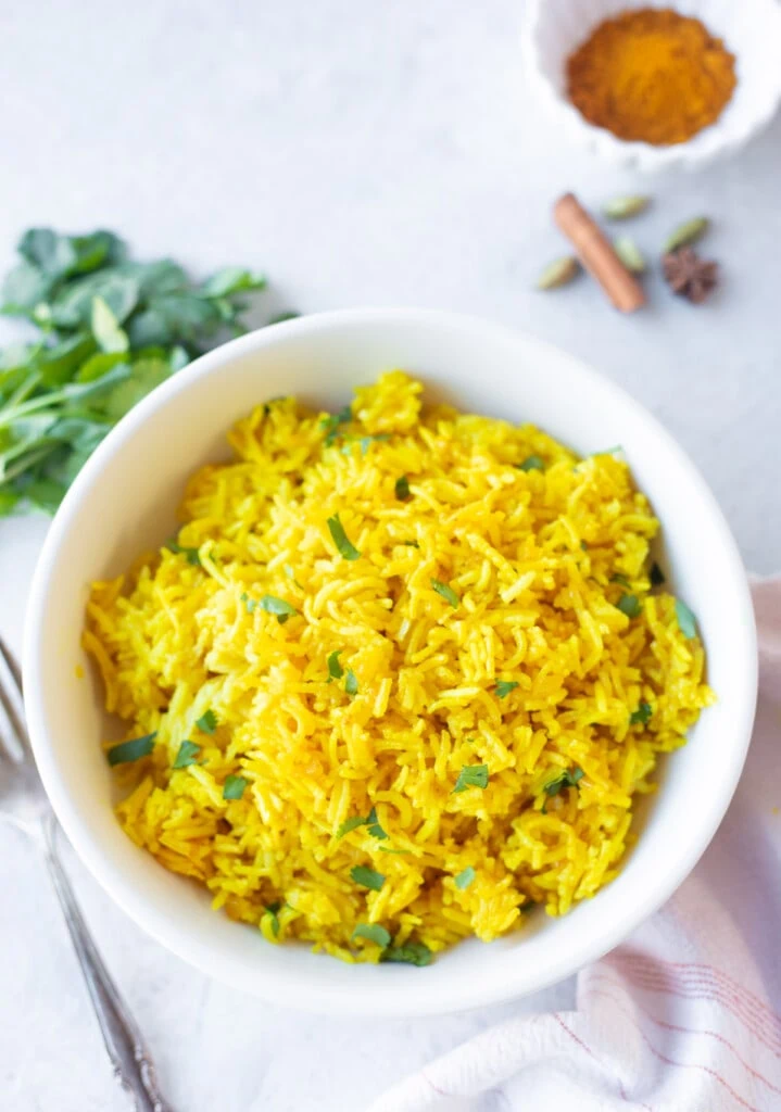 Indian yellow turmeric basmati rice in a bowl 