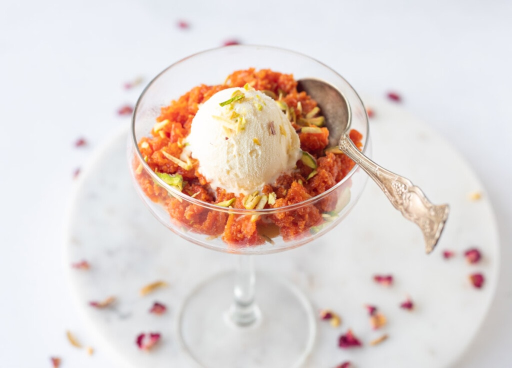 carrot halwa with ice-cream in a pretty glass bowl
