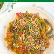 Ragda Chaat served in a plate topped with cilantro and sev
