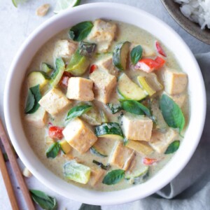 Thai Green Curry with Tofu and Vegetables in a white bowl
