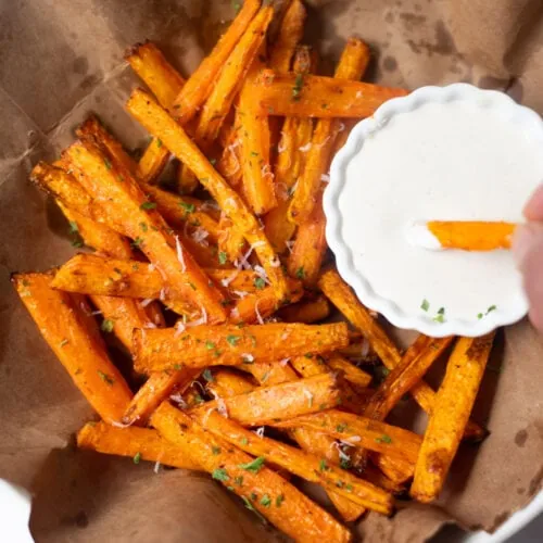 roasted carrots made in the air fryer served with a dip
