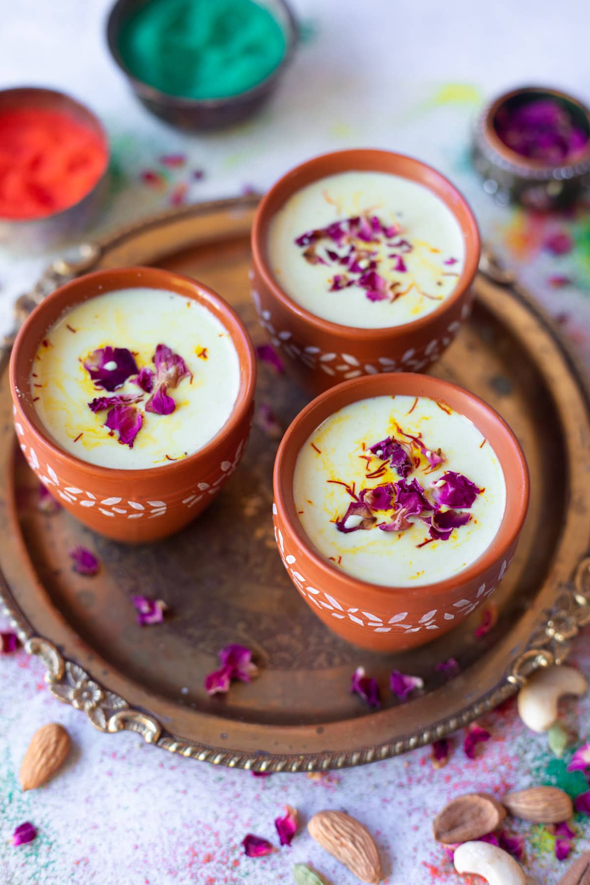 Best thandai served on 3 cups on a pretty tray for holi 