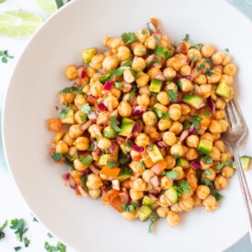 Healthy Chickpea Salad wot veggies and spices in a bowl