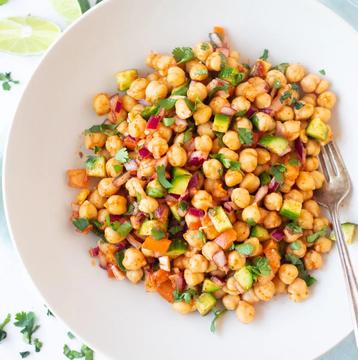 Healthy Chickpea Salad wot veggies and spices in a bowl