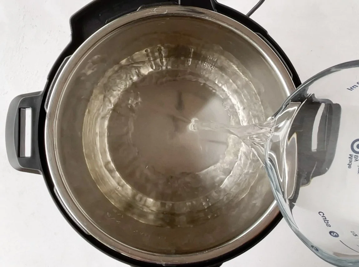 Add water to instant pot steel insert