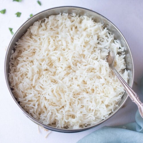 https://pipingpotcurry.com/wp-content/uploads/2022/05/instant-pot-basmati-rice-pot-in-pot-rice-Piping-Pot-Curry-500x500.jpg