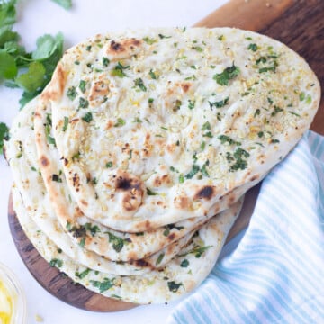Reheated naan on a platter