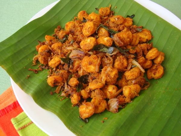 crispy prawn fry in a serving plate with banana leaf
