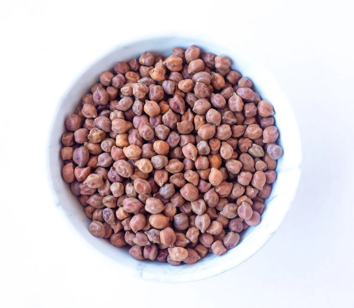 Black Chickpea, also called Kala Chana in a white bowl