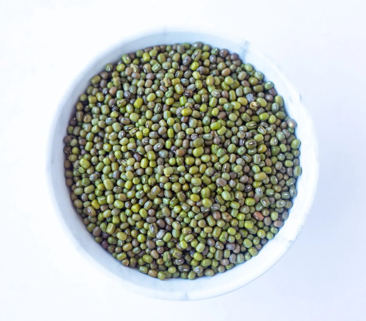Green Gram (Moong Dal) in a white bowl 