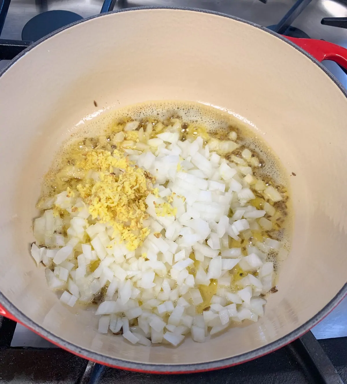 Saute onion, green chili, ginger with cumin seeds in ghee