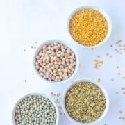 Indian pulses in white bowls
