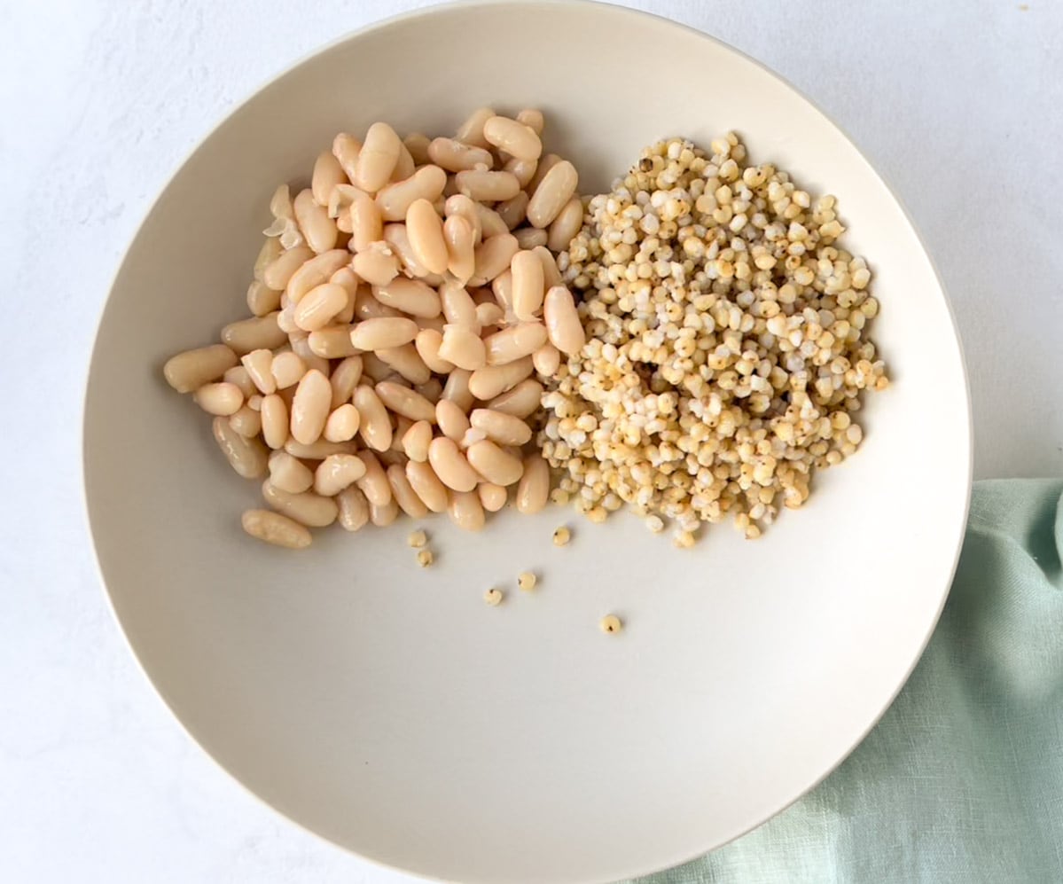 Sorghum grains and white beans in a bowl