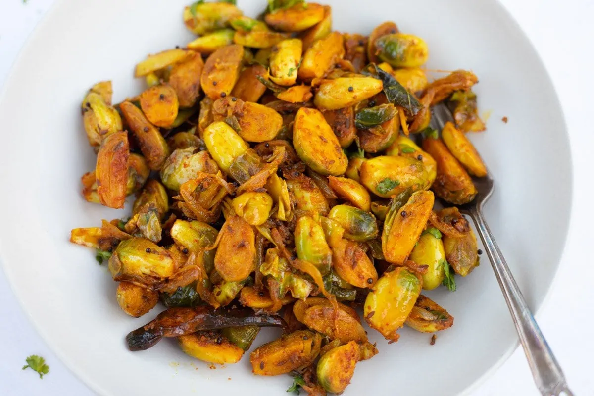 Delicious spiced indian brussels sprouts served in a plate 