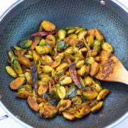 Indian style brussels sprouts cooked in a pan
