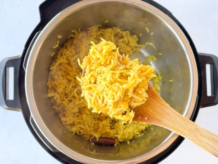 Chana dal pulao in a ladle