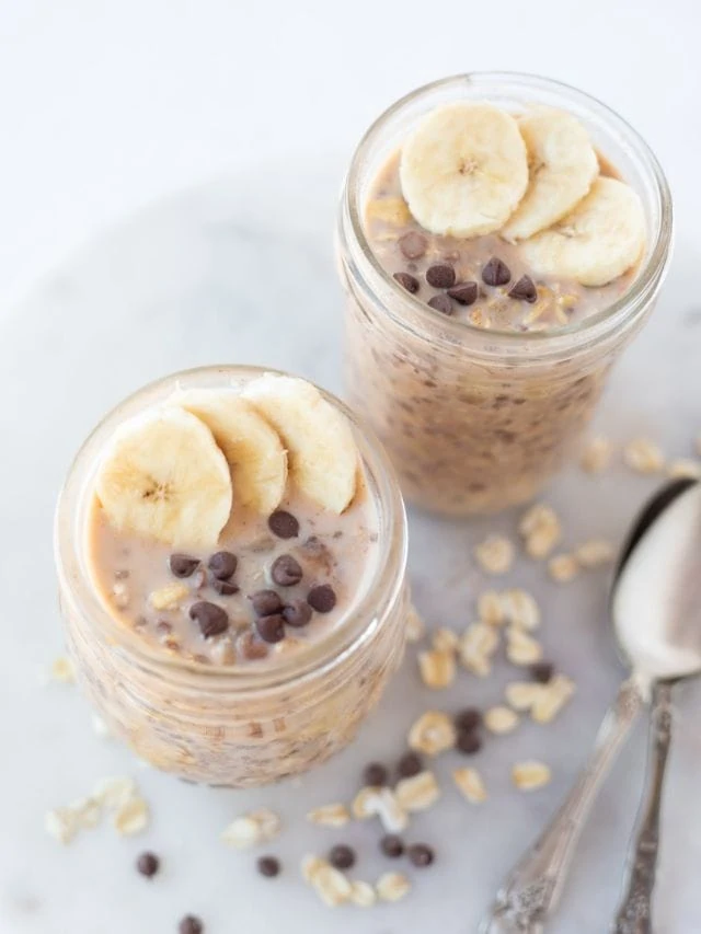 Quick overnight oats in a jar topped with banana and chocolate chips