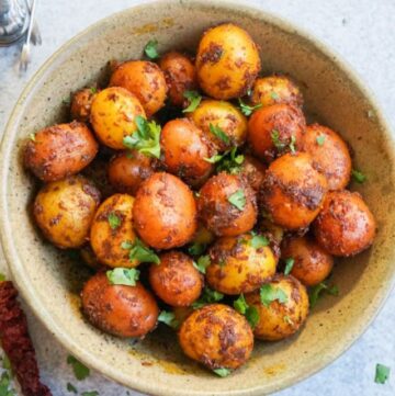 Spicy Bombay Potatoes garnished with cilantro