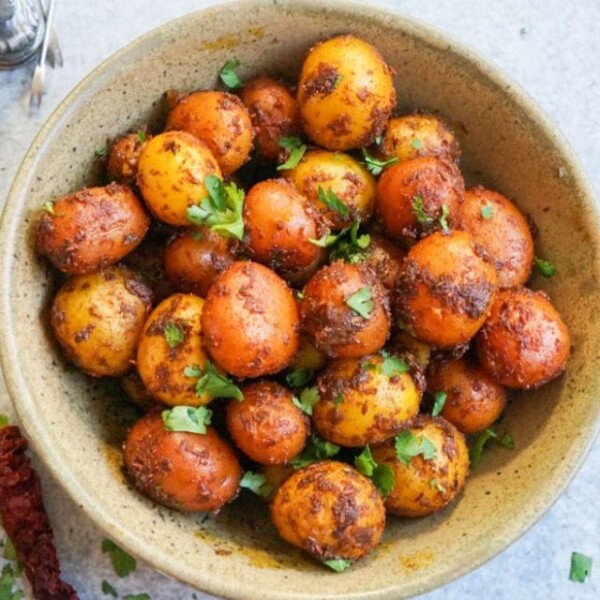 Spicy Bombay Potatoes garnished with cilantro