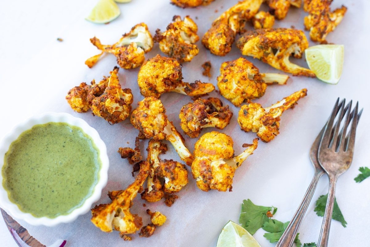 Tandoori Cauliflower served on a platter with chutney