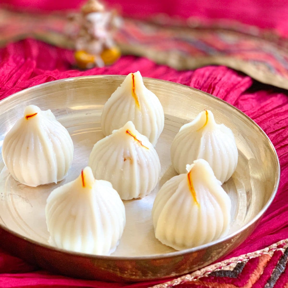 Ukadiche Modak served on a silver plate